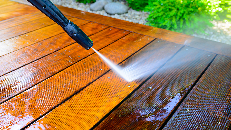 power washing a deck